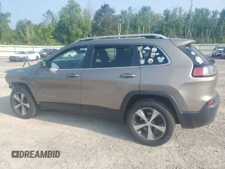 2019 Jeep Cherokee Limited with VIN 1C4PJMDX1KD270733, listed as a Copart auction lot 64125345 with 105,840 mi miles and Salvage title. Bid and sale history available at DreamBid. Image 2.