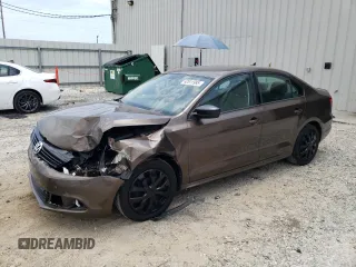 2014 Volkswagen Jetta Value Edition with VIN 3VWLL7AJ1EM308686, listed as a Copart auction lot 62611995 with 125,372 mi miles and Salvage title. Bid and sale history available at DreamBid. Image 1.