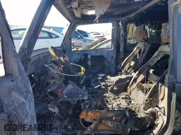 2009 Jeep Wrangler Rubicon with VIN 1J4GA64119L762714, listed as a Copart auction lot 80943364 with Not Provided miles and Salvage Title. Bid and sale history available at DreamBid. Image 7.