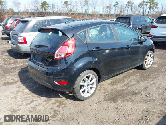 2019 Ford Fiesta SE with VIN 3FADP4EJ0KM136804, listed as a IAAI auction lot 41657106 with 999,999 mi miles. Bid and sale history available at carsss.com. Image 4.