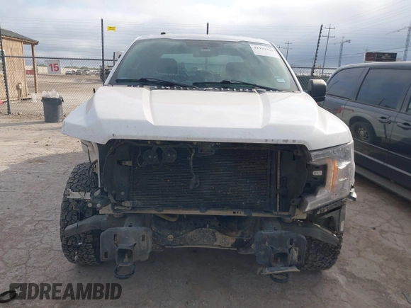 2018 Ford F-150 XL with VIN 1FTEW1E53JKE40749, listed as a IAAI auction lot 41993263 with 123,297 mi miles. Bid and sale history available at carsss.com. Image 13.