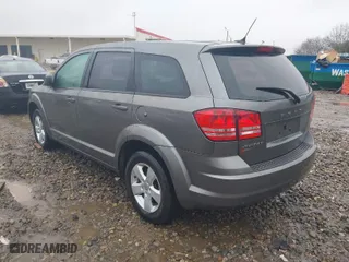 2013 Dodge Journey SE with VIN 3C4PDCAB1DT557934, listed as a IAAI auction lot 41420462 with 248,153 mi miles. Bid and sale history available at carsss.com. Image 3.