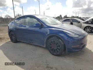 2020 Tesla Model Y Long Range with VIN 5YJYGDEE7LF038244, listed as a Copart auction lot 44153755 with 53,256 mi miles and Salvage Title. Bid and sale history available at DreamBid. Image 4.