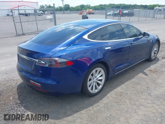 2016 Tesla Model S 70 with VIN 5YJSA1E17GF149479, listed as a IAAI auction lot 42609734 with 175,007 mi miles and . Bid and sale history available at DreamBid. Image 4.