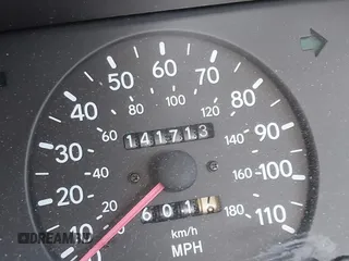 1997 Toyota Corolla with VIN 2T1BA02E0VC162383, listed as a IAAI auction lot 40715985 with 141,713 mi miles and . Bid and sale history available at DreamBid. Image 7.
