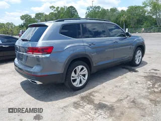 2021 Volkswagen Atlas SE with VIN 1V2HR2CA9MC585740, listed as a IAAI auction lot 42279757 with 64,995 mi miles and . Bid and sale history available at DreamBid. Image 4.