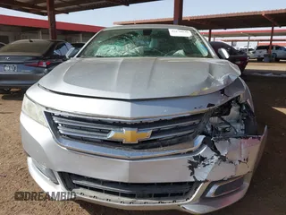 2014 Chevrolet Impala LT with VIN 1G1115SL6EU105818, listed as a IAAI auction lot 41678040 with 139,686 mi miles and . Bid and sale history available at DreamBid. Image 6.