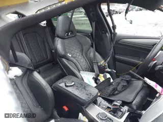 2020 BMW X4 M with VIN 5YMUJ0C01LLU67190, listed as a IAAI auction lot 41669132 with 55,609 mi miles. Bid and sale history available at carsss.com. Image 5.