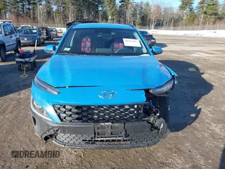 2022 Hyundai Kona SEL z VIN KM8K6CAB3NU923125, wystawiony jako IAAI lot #41014092 z przebiegiem 16 697 mil mil oraz . Historia ofert i sprzedaży dostępna na DreamBid. Obrazek 11.
