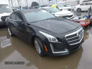 2014 Cadillac CTS Luxury AWD with VIN 1G6AX5SX3E0156938, listed as a IAAI auction lot 41574318 with 151,585 mi miles and . Bid and sale history available at carsss.com. Image 1.