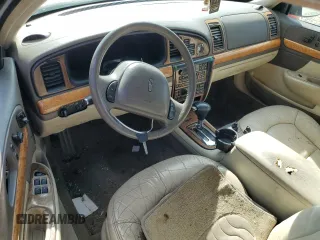 2000 Lincoln Continental with VIN 1LNHM97VXYY878511, listed as a Copart auction lot 78262834 with 143,824 mi miles and Salvage Title. Bid and sale history available at carsss.com. Image 8.
