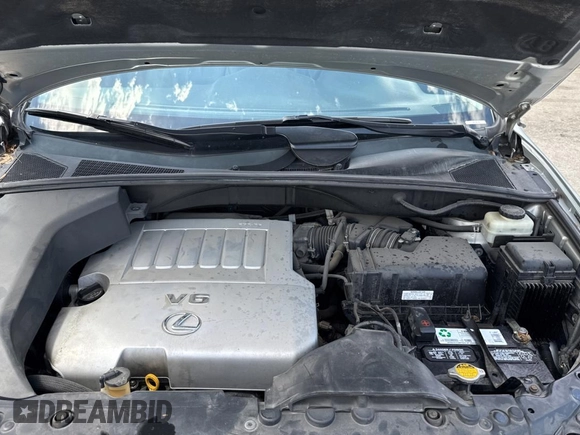 2007 Lexus RX 350 z VIN 2T2HK31U07C044365, wystawiony jako Copart lot #58370465 z przebiegiem 131 579 mil mil oraz Czysty tytuł • Clean title. Historia ofert i sprzedaży dostępna na DreamBid. Obrazek 7.