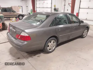 2004 Toyota Avalon XL z VIN 4T1BF28B64U389214, wystawiony jako IAAI lot #42131695 z przebiegiem 187 352 mil mil oraz . Historia ofert i sprzedaży dostępna na DreamBid. Obrazek 4.