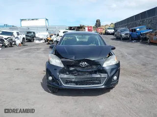 2012 Toyota Yaris L with VIN JTDKTUD35CD529596, listed as a IAAI auction lot 41439354 with 87,493 mi miles. Bid and sale history available at carsss.com. Image 6.