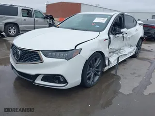 2019 Acura TLX w/A-Spec Pkg with VIN 19UUB1F60KA005081, listed as a IAAI auction lot 41559165 with 56,902 mi miles. Bid and sale history available at carsss.com. Image 2.