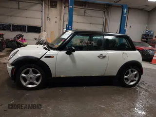 2004 MINI Hardtop with VIN WMWRC33404TC48963, listed as a IAAI auction lot 41661909 with 182,532 mi miles and . Bid and sale history available at DreamBid. Image 14.