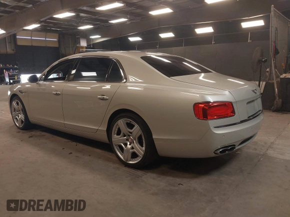 2015 Bentley Flying Spur V8 with VIN SCBET9ZAXFC042716, listed as a IAAI auction lot 42621840 with 47,299 mi miles and . Bid and sale history available at DreamBid. Image 3.