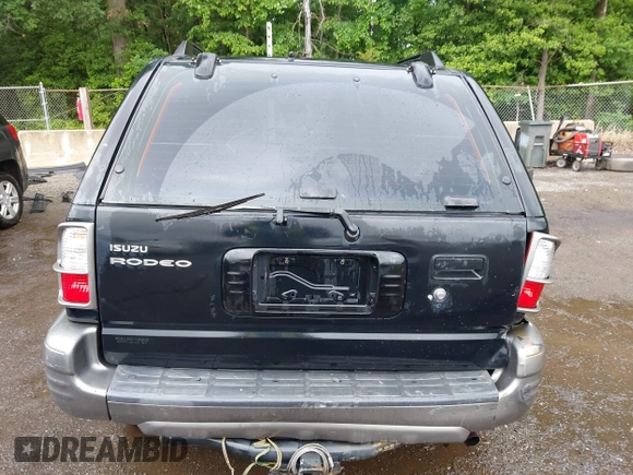 2003 Isuzu Rodeo with VIN 4S2DM58W234312253, listed as a IAAI auction lot 42319453 with 187,939 mi miles and . Bid and sale history available at DreamBid. Image 16.