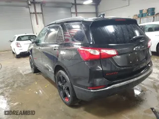 2021 Chevrolet Equinox Premier with VIN 2GNAXNEV0M6148333, listed as a Copart auction lot 48521295 with 57,886 mi miles and Clean Title. Bid and sale history available at carsss.com. Image 2.