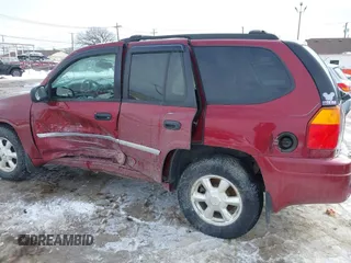2008 GMC Envoy SLE2 with VIN 1GKDT13S182132619, listed as a IAAI auction lot 41605231 with 138,458 mi miles. Bid and sale history available at carsss.com. Image 6.