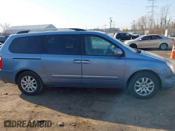 2010 Kia Sedona EX with VIN KNDMH4C38A6334878, listed as a IAAI auction lot 41772024 with 208,818 mi miles. Bid and sale history available at carsss.com. Image 14.