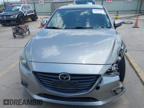 2015 Mazda 3 i Touring z VIN 3MZBM1V73FM144587, wystawiony jako IAAI lot #42422701 z przebiegiem 130 483 mil mil oraz . Historia ofert i sprzedaży dostępna na DreamBid. Obrazek 13.