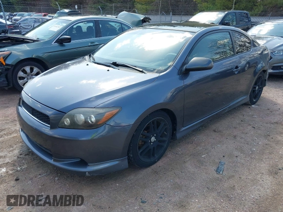 2008 Scion tC Spec with VIN JTKDE167780273485, listed as a IAAI auction lot 41918609 with 167,929 mi miles. Bid and sale history available at carsss.com. Image 2.
