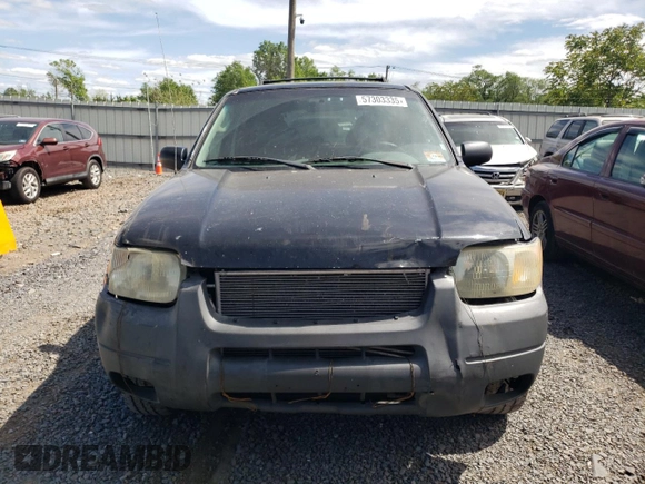 2003 Ford Escape XLT Popular 2 with VIN 1FMYU93133KB35168, listed as a Copart auction lot 57303335 with 197,368 mi miles and Salvage title. Bid and sale history available at DreamBid. Image 5.