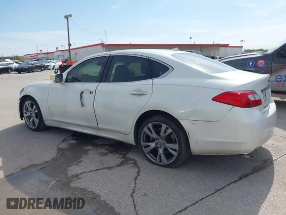 2013 Infiniti M with VIN JN1BY1AP4DM511067, listed as a IAAI auction lot 41890196 with 316,837 mi miles and . Bid and sale history available at DreamBid. Image 14.