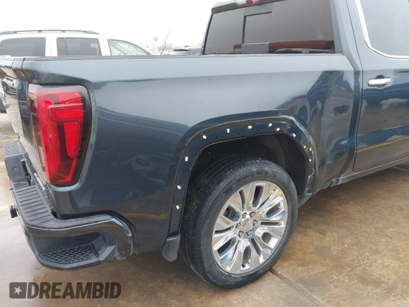 2020 GMC Sierra 1500 Denali z VIN 1GTU9FEL1LZ120581, wystawiony jako IAAI lot #41428827 z przebiegiem 97 917 mil mil oraz . Historia ofert i sprzedaży dostępna na DreamBid. Obrazek 6.