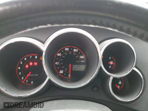 2008 Toyota Matrix STD with VIN 2T1KR32E28C700516, listed as a Copart auction lot 52072585 with 228,761 mi miles and Salvage Title. Bid and sale history available at DreamBid. Image 9.