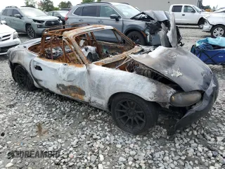 1999 Mazda MX-5 Miata z VIN JM1NB3535X0131701, wystawiony jako Copart lot #55785185 z przebiegiem Nie podano mil oraz Nie do naprawy • Non repairable. Historia ofert i sprzedaży dostępna na DreamBid. Obrazek 4.
