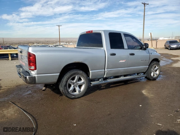 2005 Dodge Ram 1500 SLT with VIN 1D7HA18D55J573142, listed as a Copart auction lot 88745695 with 299,958 mi miles and Salvage Title. Bid and sale history available at carsss.com. Image 3.
