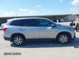 2020 Honda Pilot EX-L with VIN 5FNYF5H46LB004744, listed as a IAAI auction lot 42095298 with 76,159 mi miles and . Bid and sale history available at DreamBid. Image 12.