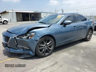 2016 Mazda 6 i Grand Touring с VIN JM1GJ1W54G1446256, выставлен на аукционе Copart как лот 59296035 с пробегом 85 274 миль миль и Списание • Salvage title. История ставок и продаж доступна на DreamBid. Изображение 1.