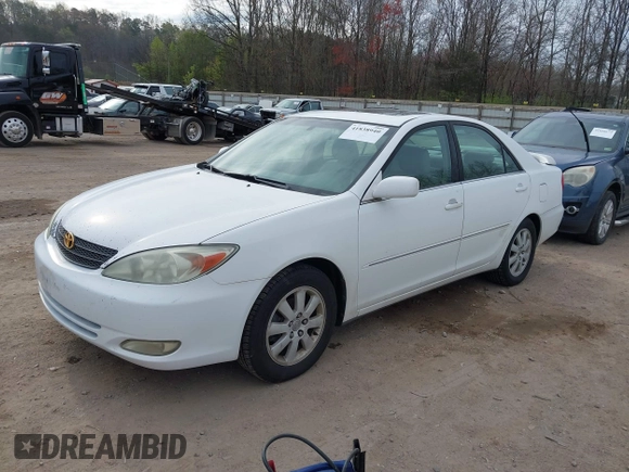 2003 Toyota Camry LE with VIN 4T1BE30K73U227420, listed as a IAAI auction lot 41838940 with 213,470 mi miles and . Bid and sale history available at DreamBid. Image 2.