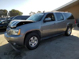 2009 Chevrolet Suburban LT w/2LT with VIN 1GNFK26359J119663, listed as a Copart auction lot 73777444 with 180,851 mi miles and Salvage Title. Bid and sale history available at carsss.com. Image 1.