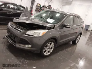 2015 Ford Escape Titanium with VIN 1FMCU0J97FUC25446, listed as a IAAI auction lot 41708585 with 150,010 mi miles. Bid and sale history available at carsss.com. Image 2.
