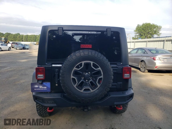 2016 Jeep Wrangler Unlimited Rubicon with VIN 1C4HJWFG9GL220687, listed as a Copart auction lot 60552705 with 49,525 mi miles and Salvage title. Bid and sale history available at DreamBid. Image 6.