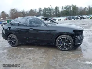 2020 BMW X4 M with VIN 5YMUJ0C01LLU67190, listed as a IAAI auction lot 41669132 with 55,609 mi miles. Bid and sale history available at carsss.com. Image 14.