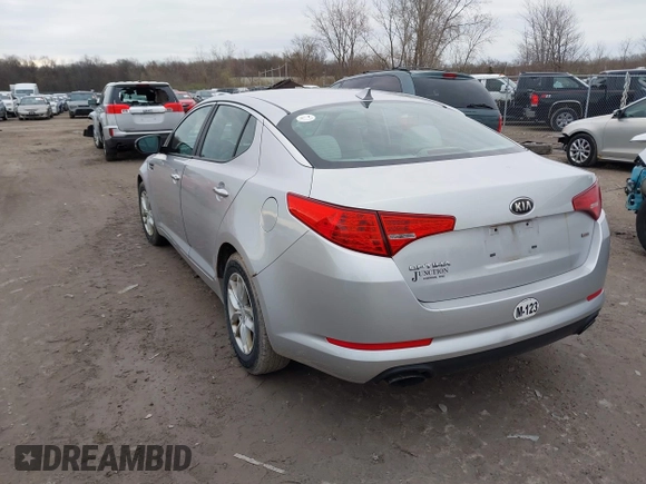 2013 Kia Optima LX with VIN KNAGM4A75D5310401, listed as a IAAI auction lot 41959774 with 198,339 mi miles. Bid and sale history available at carsss.com. Image 3.