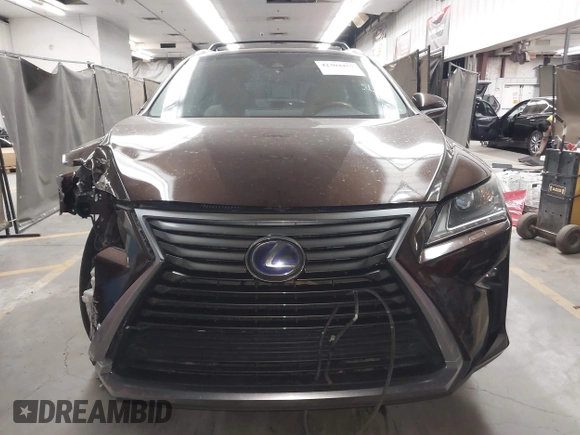 2016 Lexus RX 450h with VIN 2T2BGMCA1GC005462, listed as a IAAI auction lot 42304457 with 87,248 mi miles and . Bid and sale history available at DreamBid. Image 12.