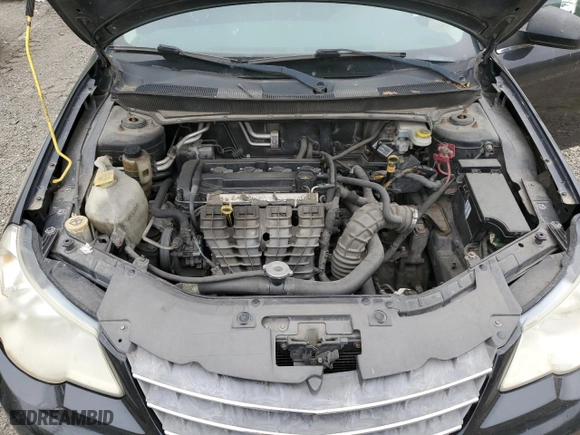 2010 Chrysler Sebring Touring with VIN 1C3CC4FB0AN134875, listed as a Copart auction lot 53635455 with 146,100 mi miles and Salvage Title. Bid and sale history available at carsss.com. Image 11.