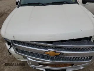 2013 Chevrolet Silverado 1500 LT with VIN 3GCPKSE79DG368320, listed as a Copart auction lot 53656865 with 188,630 mi miles and Salvage Title. Bid and sale history available at DreamBid. Image 11.