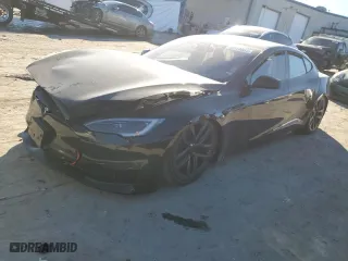 2023 Tesla Model S with VIN 5YJSA1E5XPF519570, listed as a Copart auction lot 80573863 with 0 mi miles and Salvage Title. Bid and sale history available at carsss.com. Image 1.