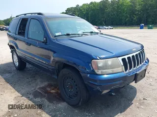 2002 Jeep Grand Cherokee Laredo z VIN 1J8GW48SX2C270339, wystawiony jako IAAI lot #42390842 z przebiegiem Nie podano mil oraz . Historia ofert i sprzedaży dostępna na DreamBid. Obrazek 1.