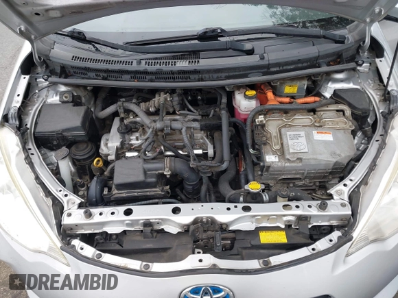 2014 Toyota Prius One with VIN JTDKDTB33E1067408, listed as a IAAI auction lot 41573895 with 245,383 mi miles and . Bid and sale history available at DreamBid. Image 10.