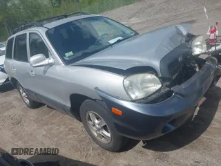 2004 Hyundai Santa Fe GLS with VIN KM8SC73D54U690040, listed as a IAAI auction lot 42276254 with 176,776 mi miles and . Bid and sale history available at DreamBid. Image 1.