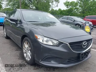 2014 Mazda 6 i Sport with VIN JM1GJ1U52E1102800, listed as a IAAI auction lot 42266283 with 103,886 mi miles and . Bid and sale history available at DreamBid. Image 1.