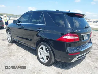 2015 Mercedes-Benz M 400 with VIN 4JGDA5GB4FA559004, listed as a IAAI auction lot 41932299 with 84,749 mi miles and . Bid and sale history available at DreamBid. Image 3.